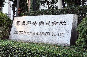 Power Development signboard and logo